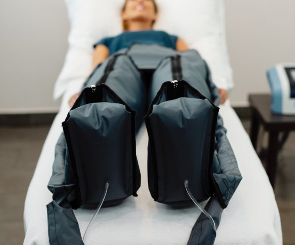 Close-up of pressotherapy treatment at health spa.